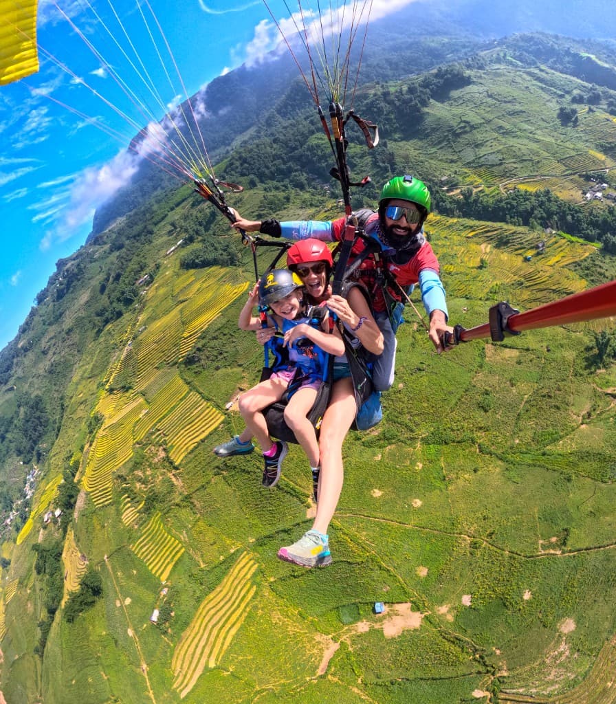 Tandem paragliding over Sapa rice terraces